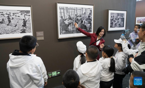 Students, Teachers Visit Photo Exhibition on China's Historic Transformation in Beijing