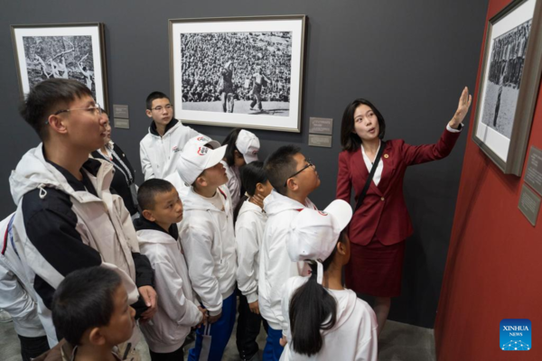 Students, Teachers Visit Photo Exhibition on China's Historic Transformation in Beijing