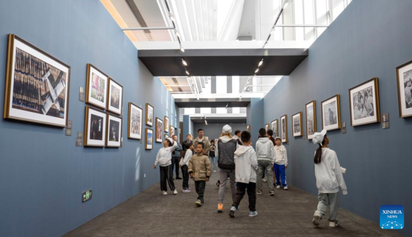 Students, Teachers Visit Photo Exhibition on China's Historic Transformation in Beijing