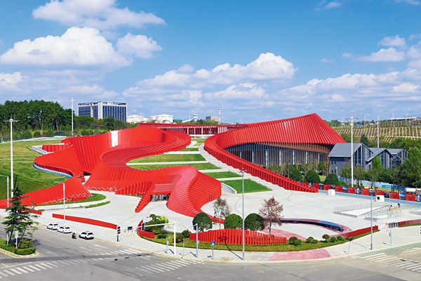 Immersive Stage Performance Highlighting Red History