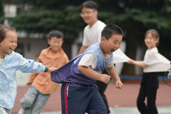 University Student Volunteers Offer Care, Love to Rural Children