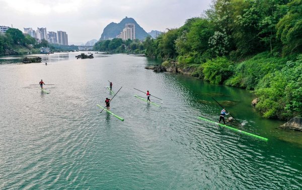 Single Bamboo Drifing Team from Guangxi Shines at the 12th National Traditional Games of Ethnic Minorities of China