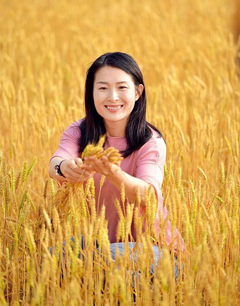 Young Woman Uses Beidou System to Facilitate Farming