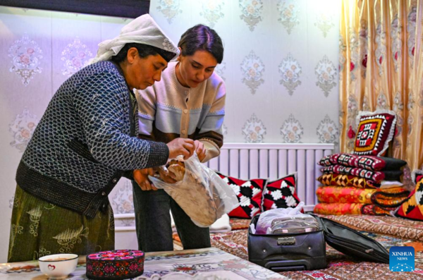 Ethnic Tajik Train Conductor's Journey amid China's Spring Festival Travel Season