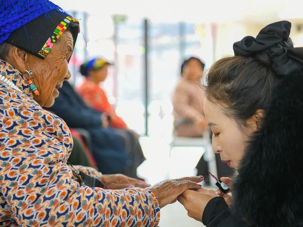 An NPC Deputy's Persisting Bond with Senior Citizens Through Caregiving