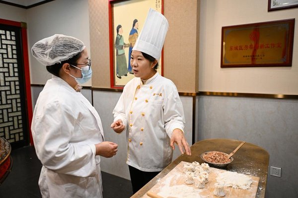 From Shaomai Chef to NPC Deputy: Serving People with Passion, Dedication